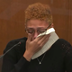 In this screen grab from video, Alayna Albrecht-Payton, the woman who was in Daunte Wright’s vehicle when he was fatally shot on April 11, 2021, by police in a Minneapolis suburb last year, testifies as Hennepin County Judge Regina Chu presides over court, Dec. 9, 2021, in the trial of former Brooklyn Center Police Officer Kim Potter at the Hennepin County Courthouse in Minneapolis. Albrecht-Payton is suing the city and the former officer, Potter, who killed him.